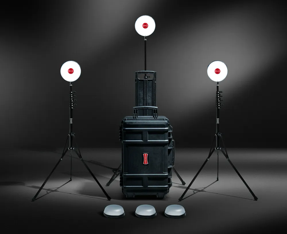 Rotolight NEO 3 3-Light Kit — three RGBWW LED heads on stands with diffuser domes and a rolling hard case